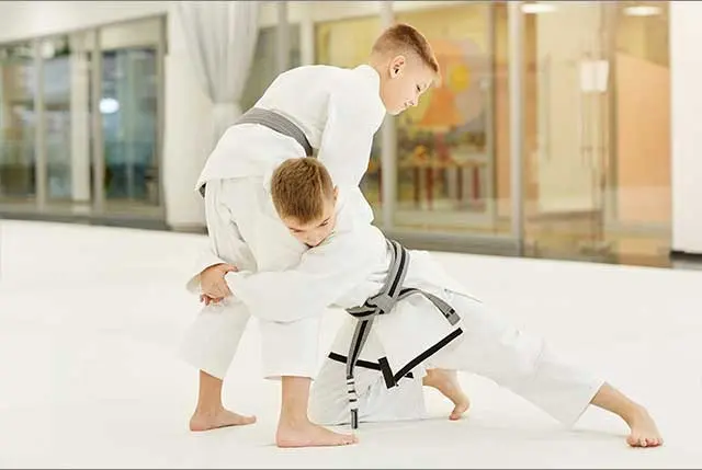 two students sparring for kids martial arts lessons